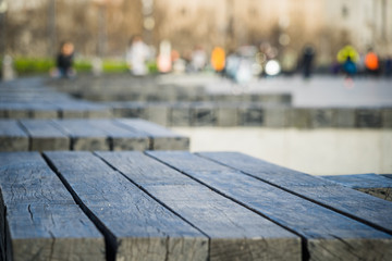 empty bench on pavement in city of China.