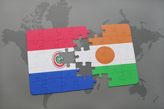 puzzle with the national flag of paraguay and niger on a world map