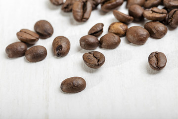 Brown coffee beans on the table