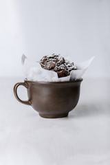 Chocolate muffin sprinkled with icing sugar