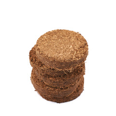Compressed compost tablet isolated