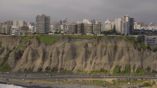 Lima Peru Aerial v1 Flying low besides Miraflores cliff side and Larcomar Mall.