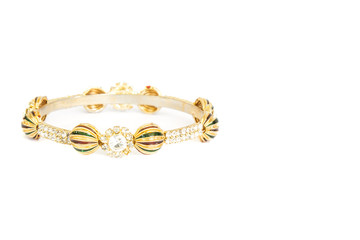 Gold bracelets with gem and diamonds isolate on white background.