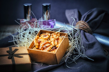 A carton gift box with present