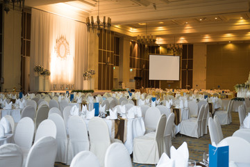 Beautiful  ballroom decorated for a wedding reception with clipping path of projector screen