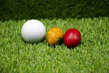 Golf ball and easter eggs