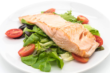 grilled salmon steak on white