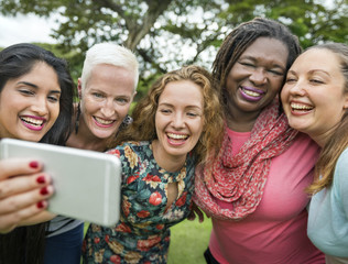 Obraz premium Group Of Women Taking Pictures Concept