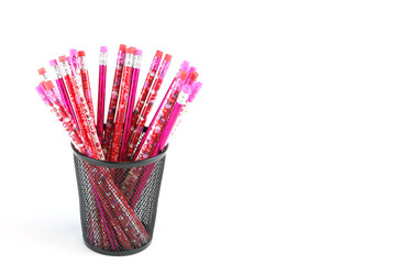 colorful pencils in the metal pen pot