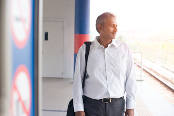 indian business male at train station