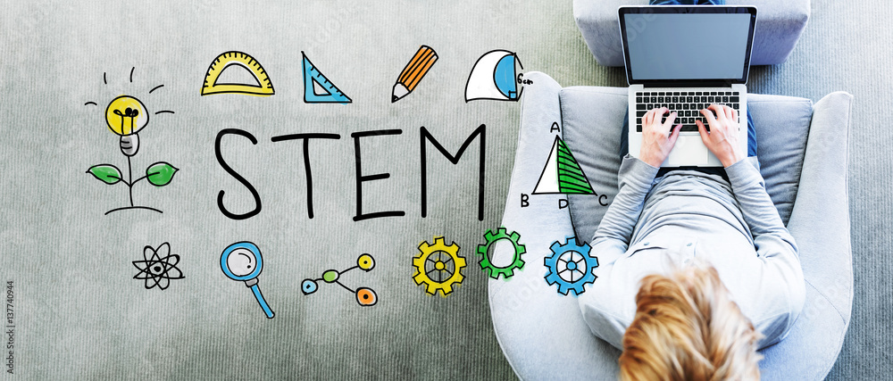 Wall mural stem text with man using a laptop