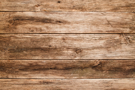 Old shabby wooden background close-up. Grungy wood texture, aged rustic table, free space for text or advertisement