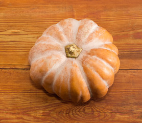 Pumpkin on a wooden surface