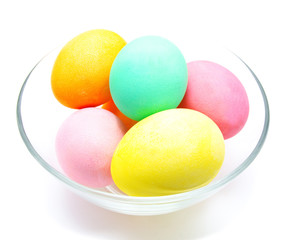 Colorful easter eggs isolated in bowl