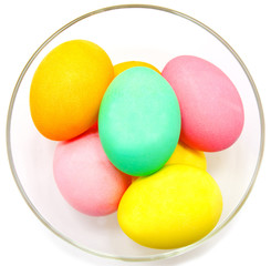 Colorful easter eggs isolated in bowl