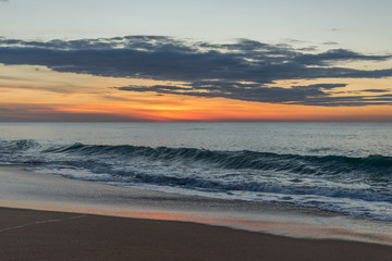 Fototapeta na wymiar Sunrise at the beach