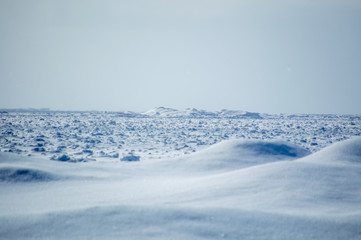 Fototapeta na wymiar Lake huron icebergs and snow dunes landscape