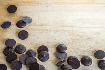Closeup of chocolate on wooden background