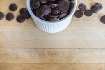 Closeup of chocolate on wooden background