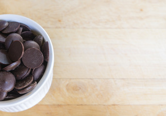 Closeup of chocolate on wooden background