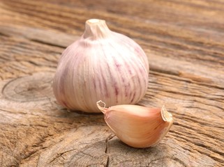  Garlic on the wooden background