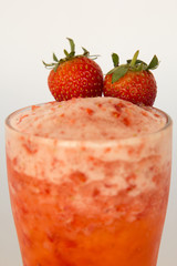 Juice strawberry smoothie. On a white background