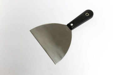 Metal spatula on white background