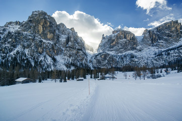 Fototapeta premium Morning view of snow valley near Canazei of Val di Fassa, Trentino-Alto-Adige region, Italy.