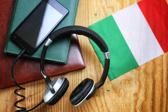 headphones and flag on a wooden background