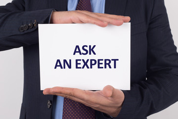 Man showing paper with ASK AN EXPERT text