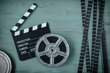 Clapperboards and the reel of film