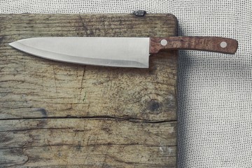 Kitchen knife with a wooden handle - 137757371