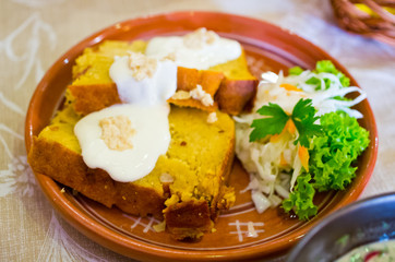 Potato cake with sour cream