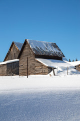Snowy barns in the sunshine in Northern Ontario