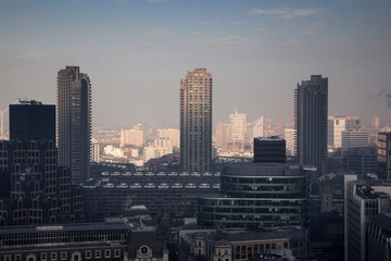 rooftop view over London on a foggy day from St Paul's cathedral, UK