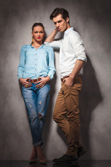 casual man leaning elbow on his girlfriend