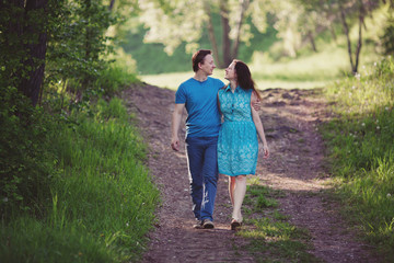 Happy loving couple having fun and enjoying in park