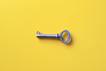 Key on a yellow background.