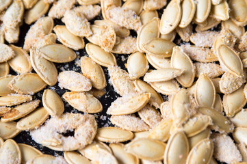 Baked pumpkin seeds covered with salt