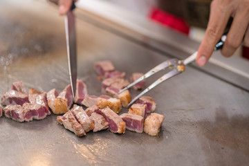 cooking beef steak on pan