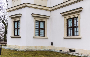Fototapeta na wymiar Ujazdowski Castle in late winter. City of Warsaw, Poland. Details of the facade..