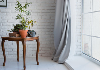 desk with a chair by the window