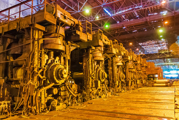 steel plant shop with equipment and machinery, industrial background