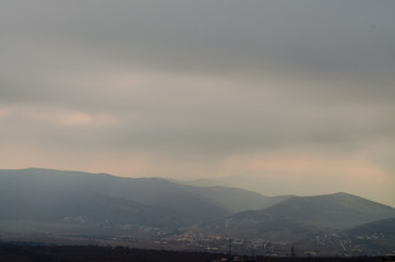 Fototapeta na wymiar overcast sky in the misty mountains