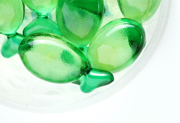 The green color vitamin capsule represent the medicine and healthcare concept related idea.