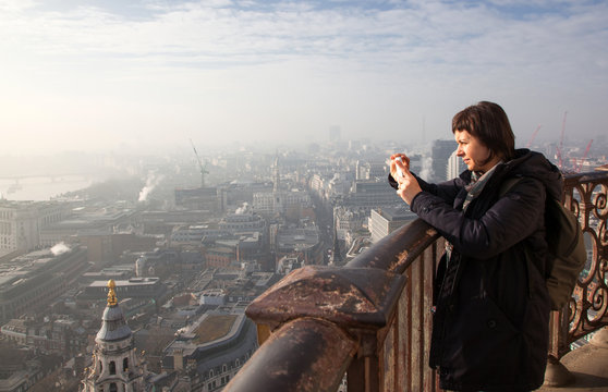 woman tourist on top of St Paul's cathedral, London