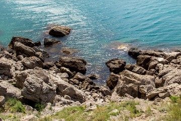 Fototapeta na wymiar Beautiful seascape: large stones in blue water