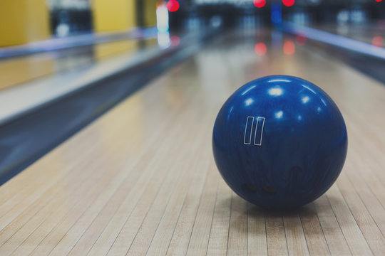 Bowling ball closeup on lane background