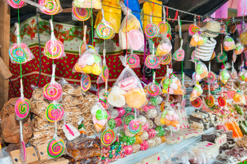 Fototapeta na wymiar Lollipops and sweets sale at market , Guatemala.