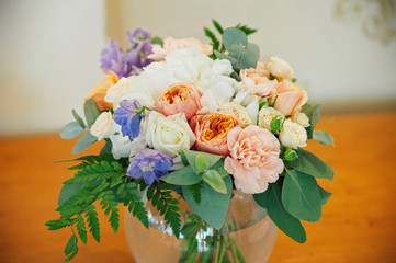 Wedding decorating bouquet of roses and petals, closeup